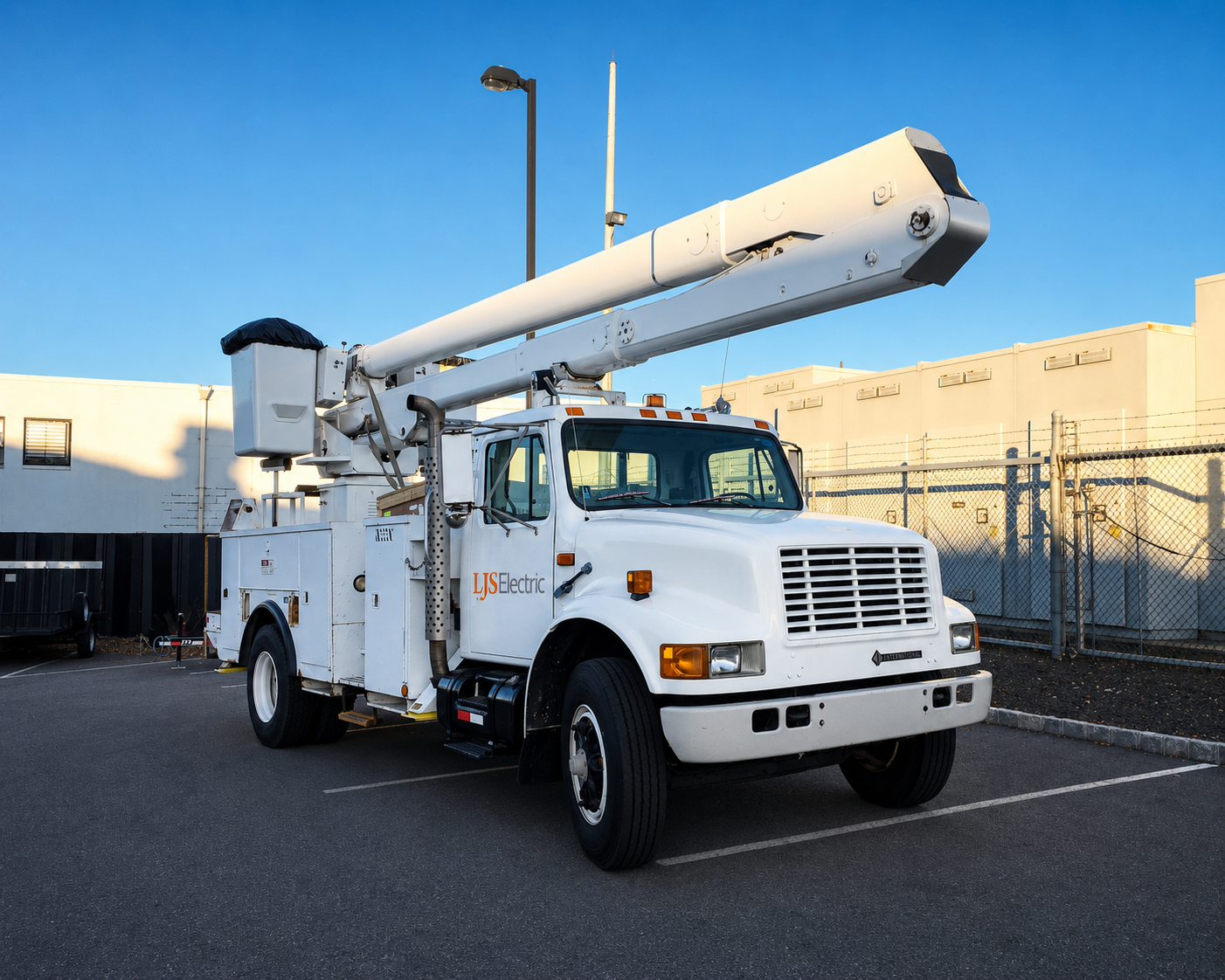 LJS Electric company-owned bucket truck and fleet